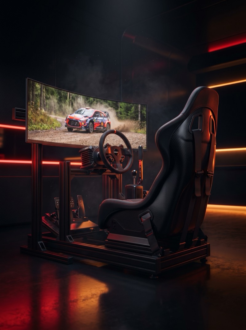 APEX Rally симрейсинг кокпит с кръгъл волан, ръчна спирачка и извит UltraWide монитор, осветен в червено